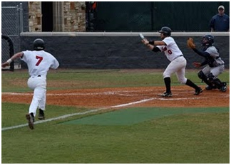 Player is running towards home as Batter is getting ready to Bunt